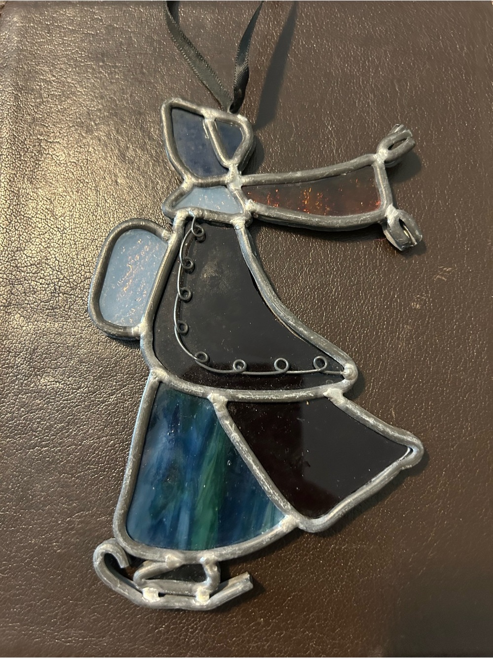 Stained Glass Ice Skater Ornament in Blue, maroon & Brown